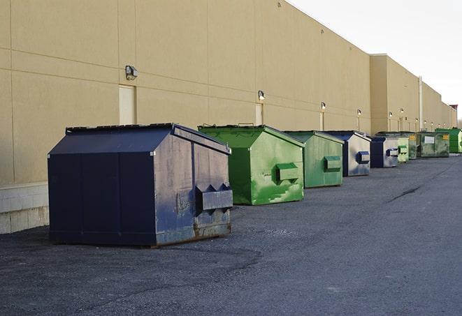 large garbage containers clustered on a construction lot in Fountain Green UT